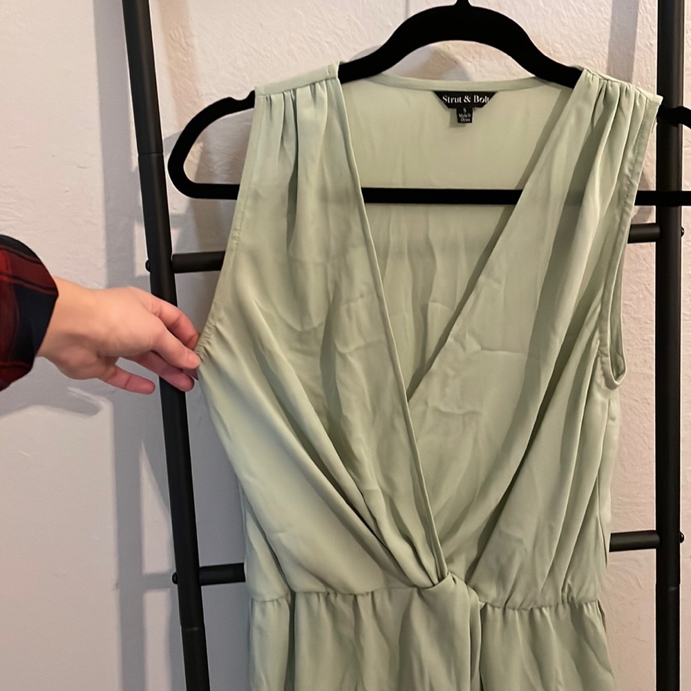Lovely mint faux-wrap blouse with knot detail and flowy bottom